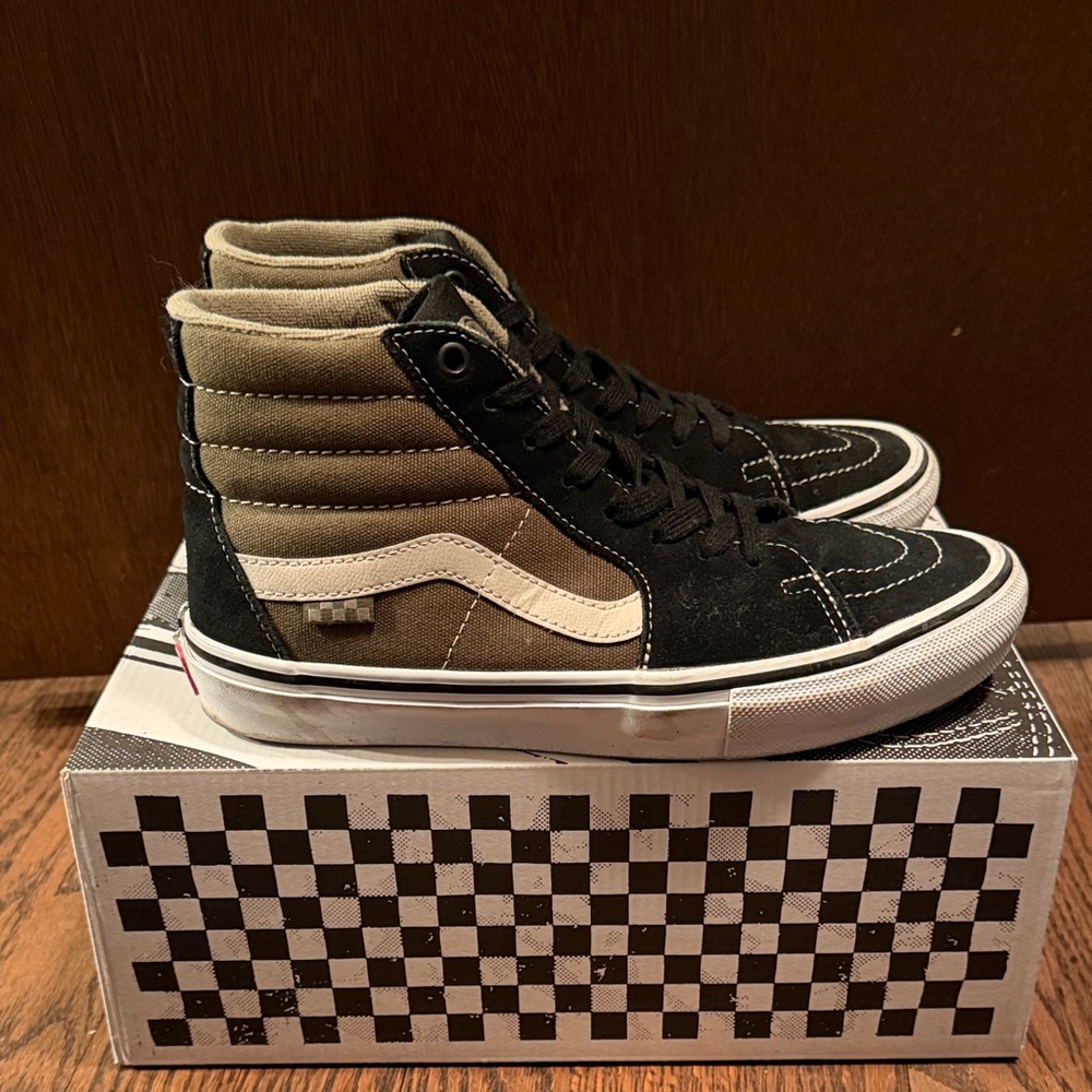 Vans Black and White High-Top Sneakers